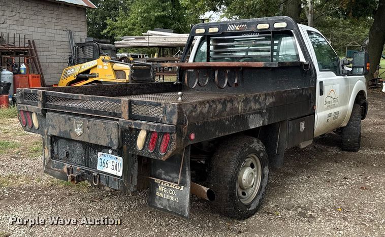 image for item DY8205 2013 Ford F250 Super Duty flatbed pickup truck