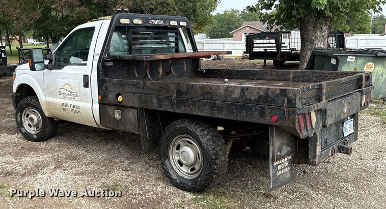 image for item DY8205 2013 Ford F250 Super Duty flatbed pickup truck