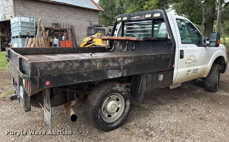 image for item DY8205 2013 Ford F250 Super Duty flatbed pickup truck