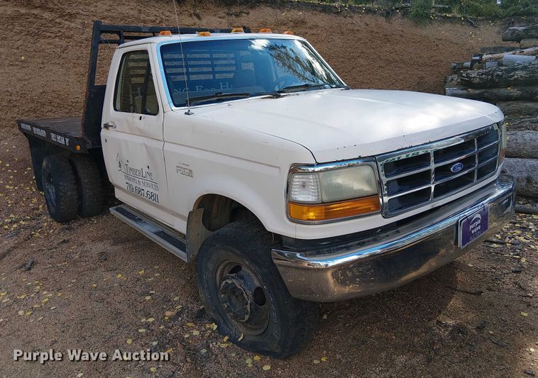 image for item EC1210 1992 Ford F Super Duty dump flatbed truck