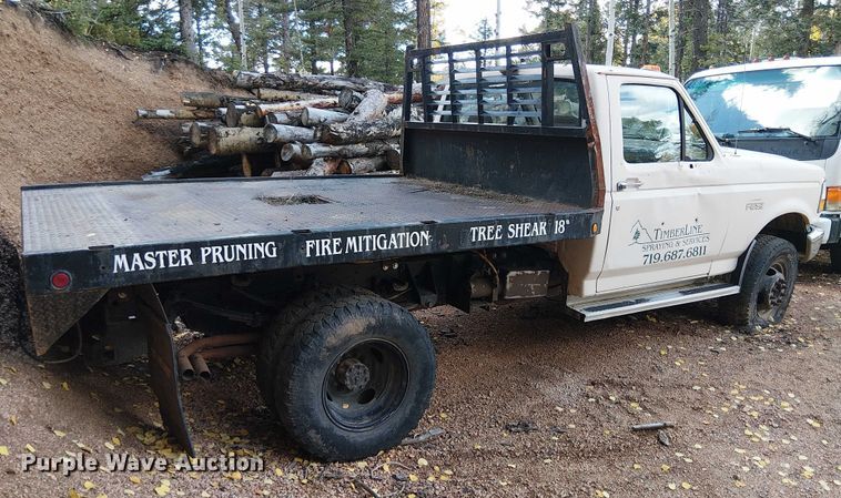 image for item EC1210 1992 Ford F Super Duty dump flatbed truck