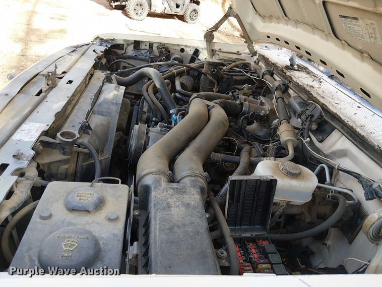 image for item EC1210 1992 Ford F Super Duty dump flatbed truck