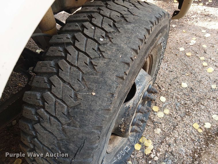 image for item EC1210 1992 Ford F Super Duty dump flatbed truck