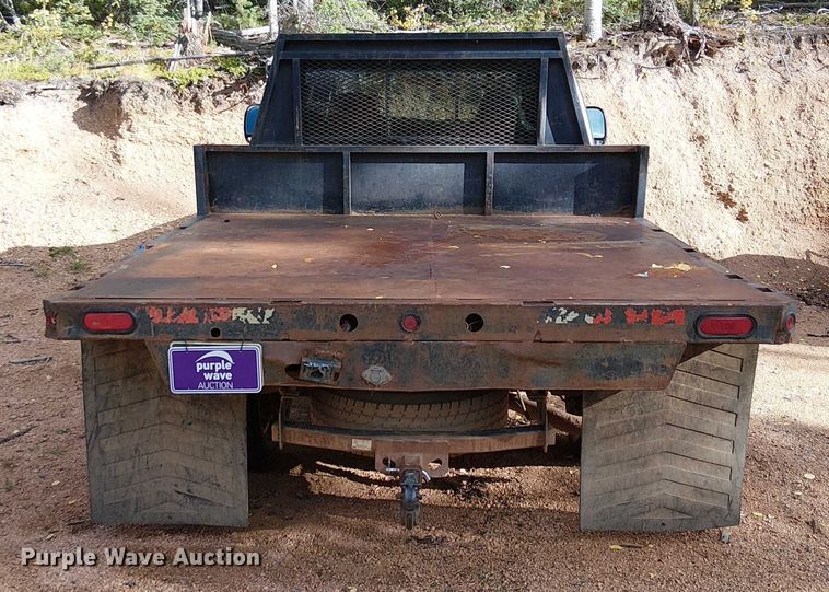 image for item EC1211 2003 Ford F250 Super Duty Crew Cab dump flatbed pickup truck