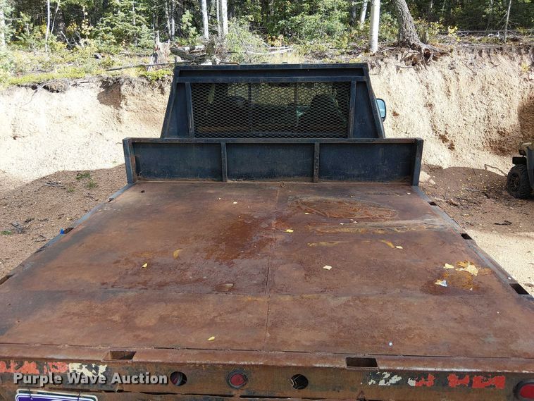 image for item EC1211 2003 Ford F250 Super Duty Crew Cab dump flatbed pickup truck