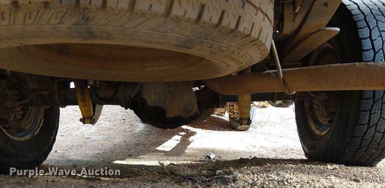 image for item EC1211 2003 Ford F250 Super Duty Crew Cab dump flatbed pickup truck