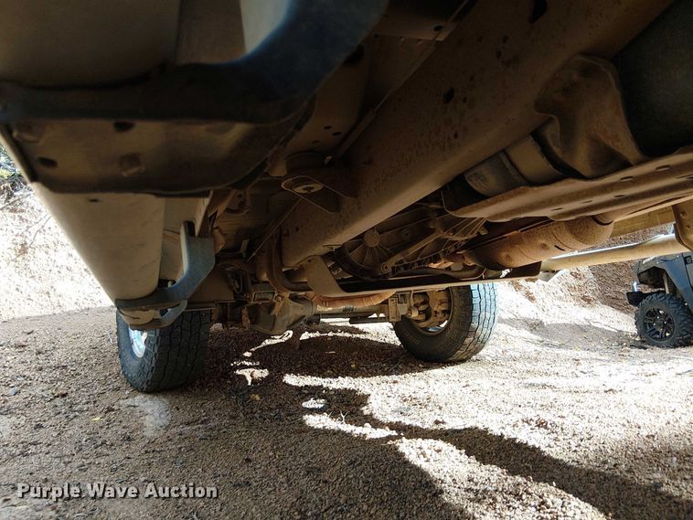 image for item EC1211 2003 Ford F250 Super Duty Crew Cab dump flatbed pickup truck