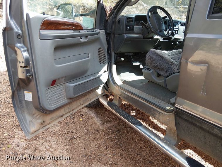 image for item EC1211 2003 Ford F250 Super Duty Crew Cab dump flatbed pickup truck