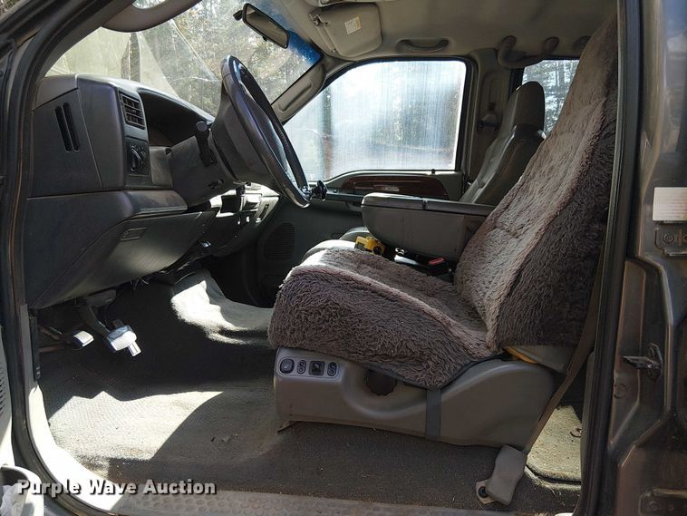 image for item EC1211 2003 Ford F250 Super Duty Crew Cab dump flatbed pickup truck