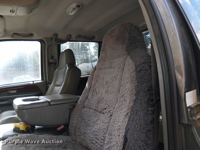 image for item EC1211 2003 Ford F250 Super Duty Crew Cab dump flatbed pickup truck