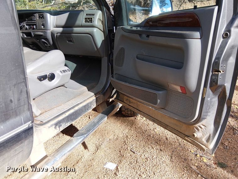 image for item EC1211 2003 Ford F250 Super Duty Crew Cab dump flatbed pickup truck