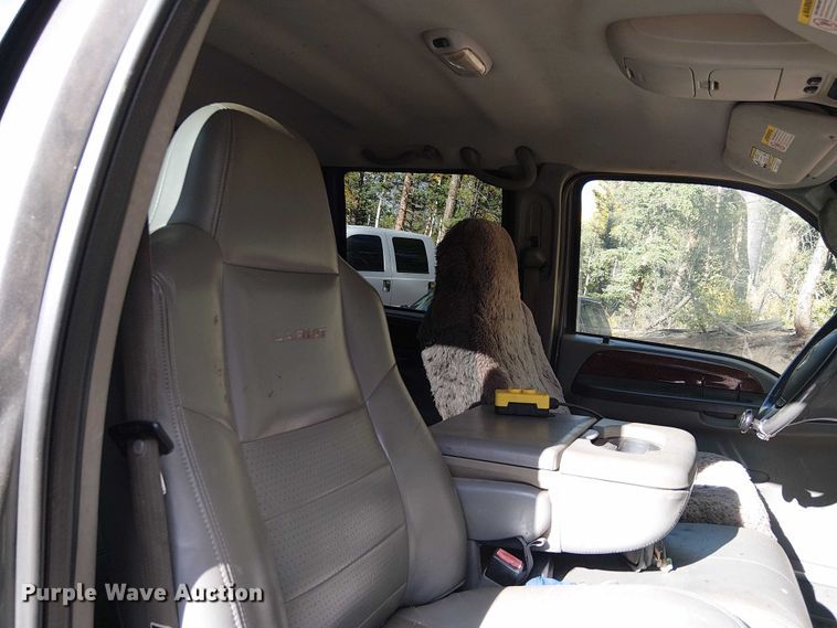 image for item EC1211 2003 Ford F250 Super Duty Crew Cab dump flatbed pickup truck