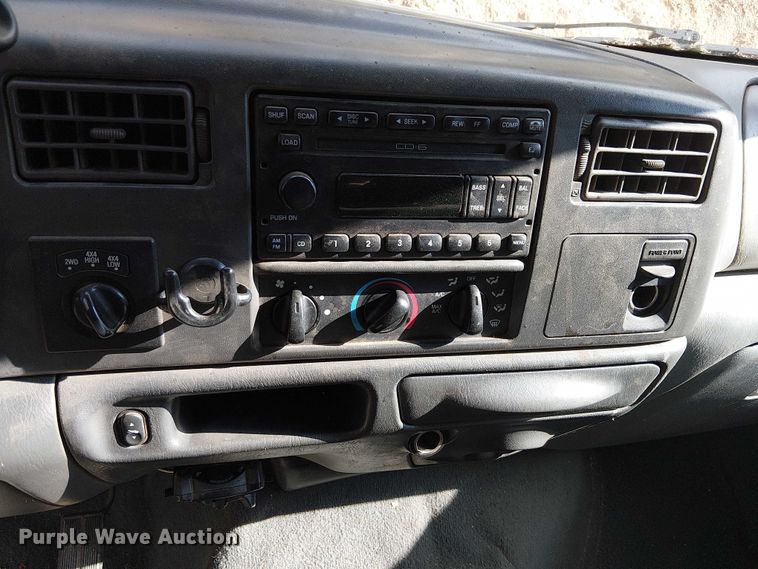 image for item EC1211 2003 Ford F250 Super Duty Crew Cab dump flatbed pickup truck