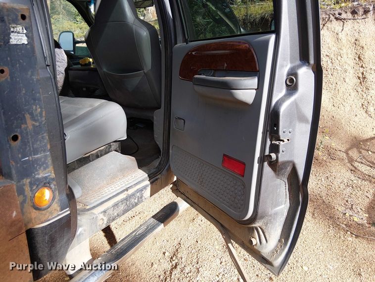 image for item EC1211 2003 Ford F250 Super Duty Crew Cab dump flatbed pickup truck