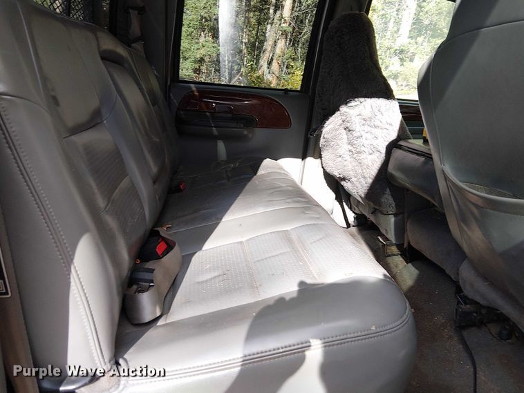 image for item EC1211 2003 Ford F250 Super Duty Crew Cab dump flatbed pickup truck