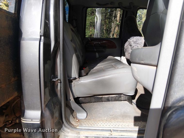 image for item EC1211 2003 Ford F250 Super Duty Crew Cab dump flatbed pickup truck