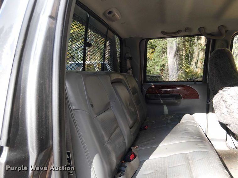 image for item EC1211 2003 Ford F250 Super Duty Crew Cab dump flatbed pickup truck