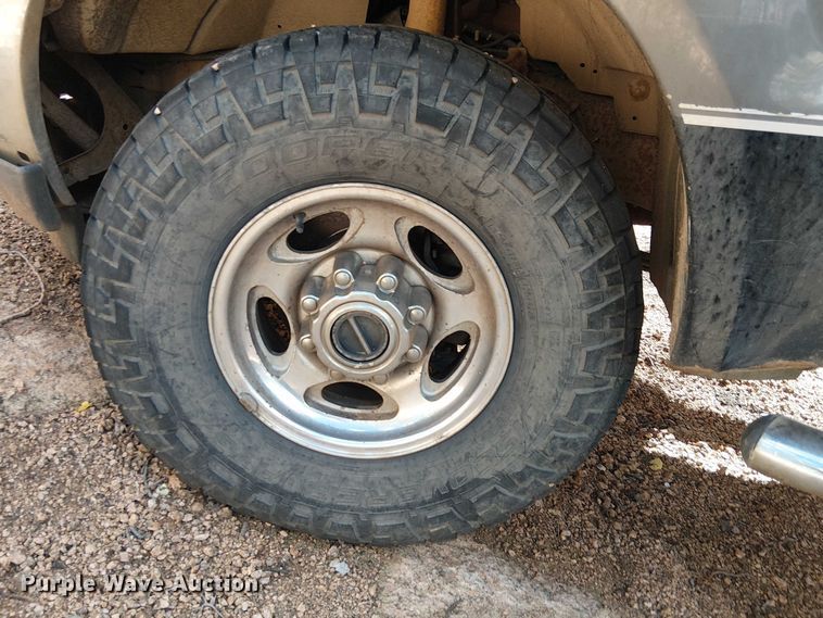 image for item EC1211 2003 Ford F250 Super Duty Crew Cab dump flatbed pickup truck