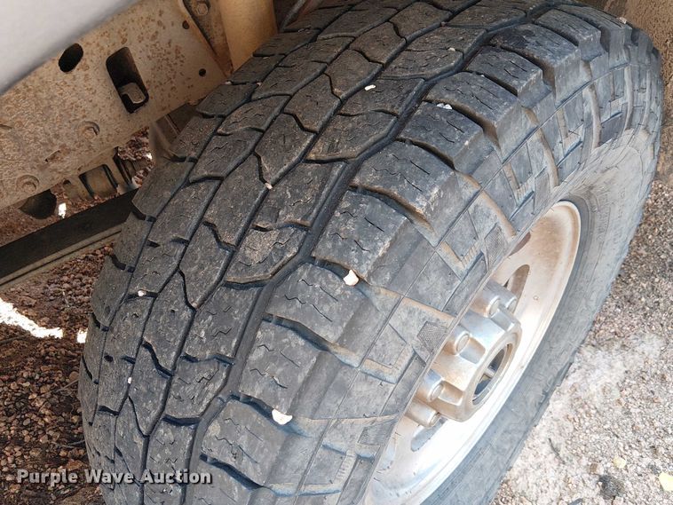 image for item EC1211 2003 Ford F250 Super Duty Crew Cab dump flatbed pickup truck