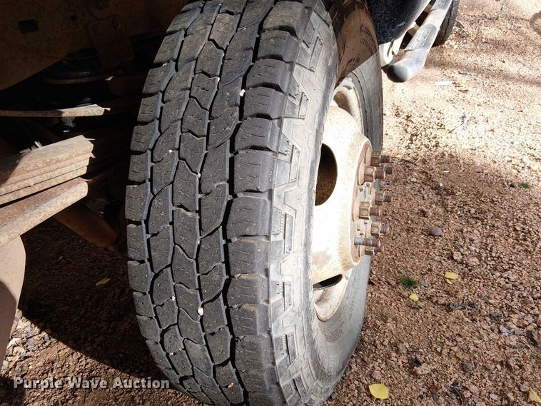 image for item EC1211 2003 Ford F250 Super Duty Crew Cab dump flatbed pickup truck