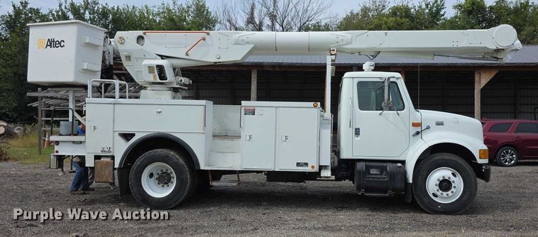 CAMIóN CON CANASTILLA 2000 INTERNATIONAL ALTEC