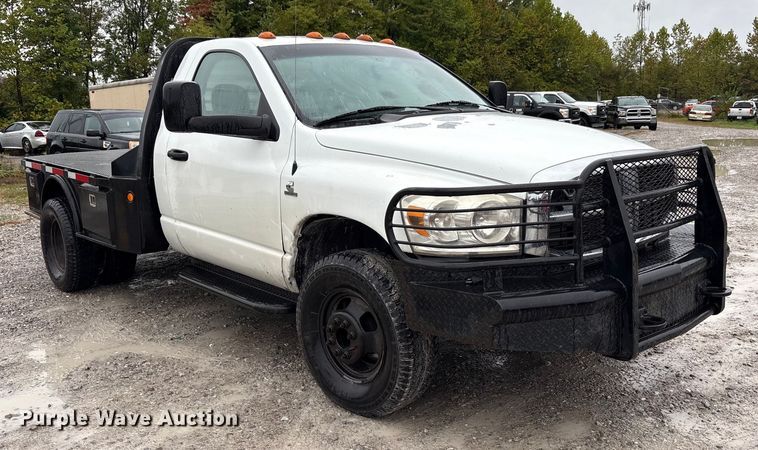 image for item EM6104 2006 Dodge Ram 3500 flatbed pickup truck