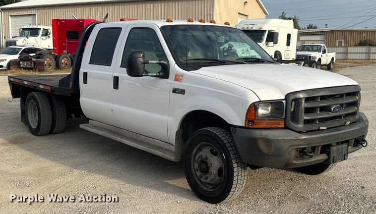 image for item EV1990 1999 Ford F550 Super Duty Crew Cab flatbed truck