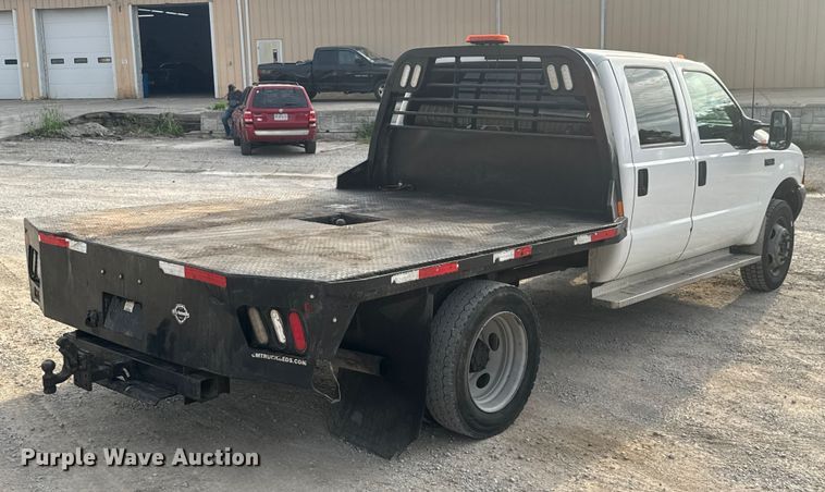image for item EV1990 1999 Ford F550 Super Duty Crew Cab flatbed truck