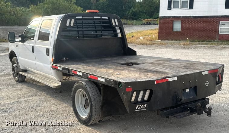 image for item EV1990 1999 Ford F550 Super Duty Crew Cab flatbed truck