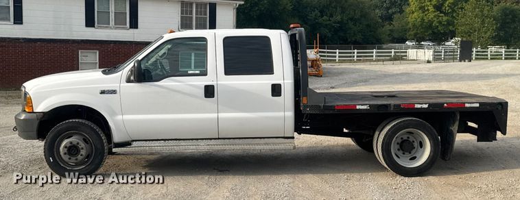 image for item EV1990 1999 Ford F550 Super Duty Crew Cab flatbed truck