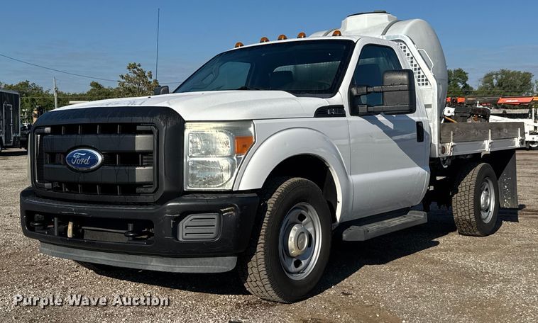 image for item NU9702 2011 Ford F350 Super Duty XL flatbed pickup truck