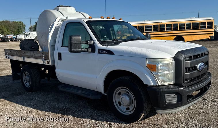 image for item NU9702 2011 Ford F350 Super Duty XL flatbed pickup truck