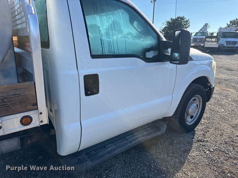 image for item NU9702 2011 Ford F350 Super Duty XL flatbed pickup truck