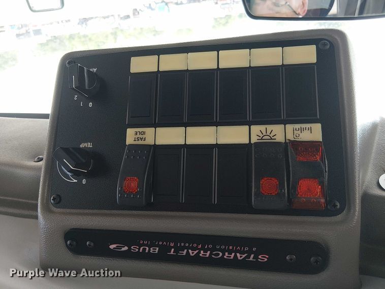 image for item NU9714 2015 Ford E350 Super Duty shuttle bus