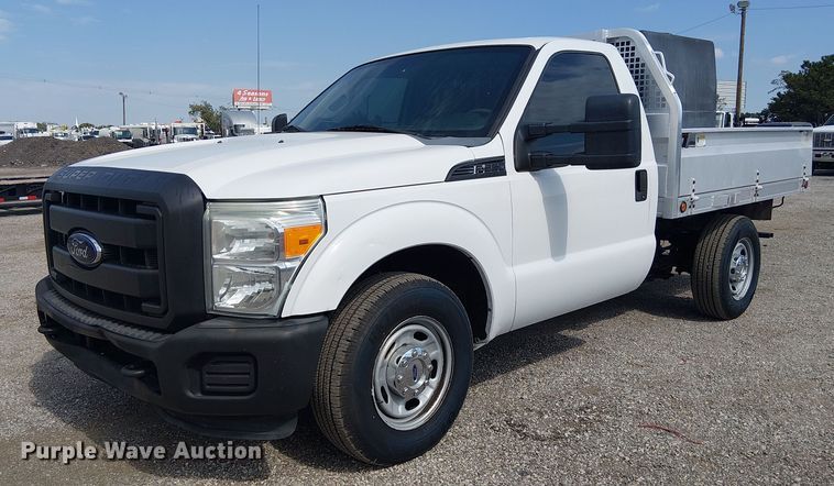 image for item NU9716 2012 Ford F250 Super Duty flatbed pickup truck