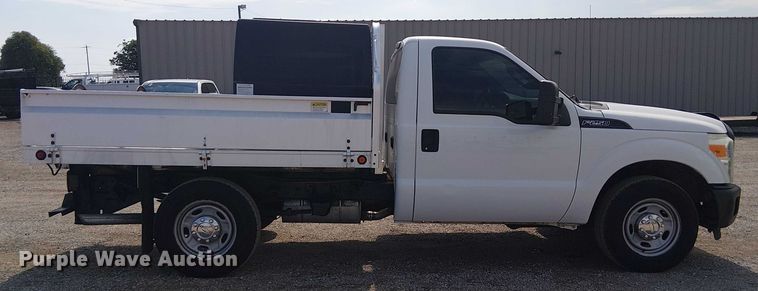 image for item NU9716 2012 Ford F250 Super Duty flatbed pickup truck