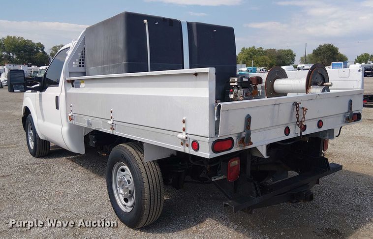 image for item NU9716 2012 Ford F250 Super Duty flatbed pickup truck