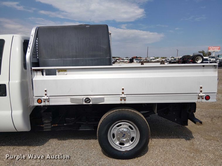 image for item NU9716 2012 Ford F250 Super Duty flatbed pickup truck