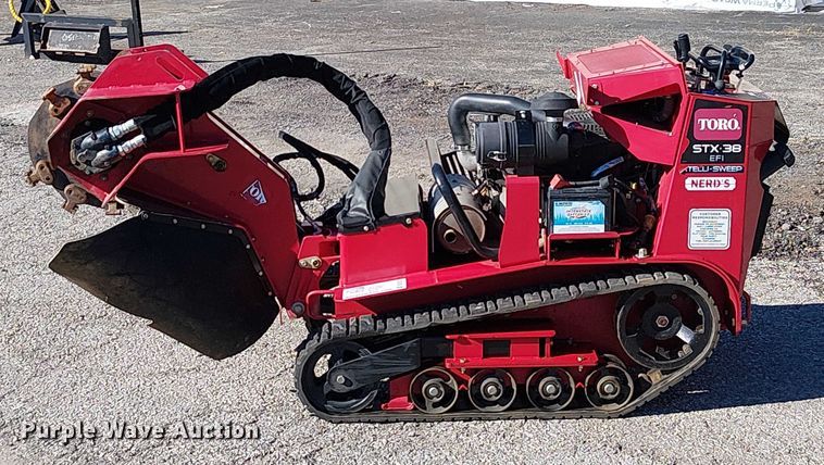 image for item DU3553 Toro STX 38 EFI Intelli-Sweep stump grinder