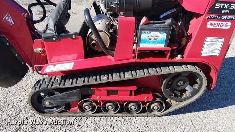 image for item DU3553 Toro STX 38 EFI Intelli-Sweep stump grinder