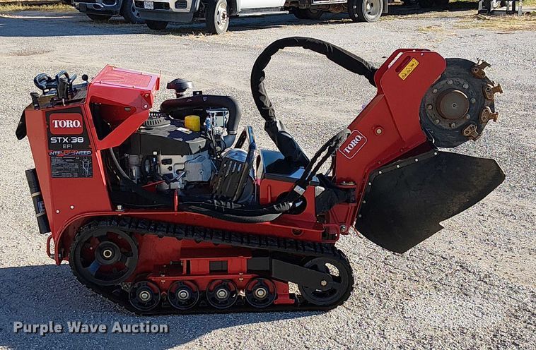 image for item DU3555 Toro STX 38 EFI Intelli-Sweep stump grinder