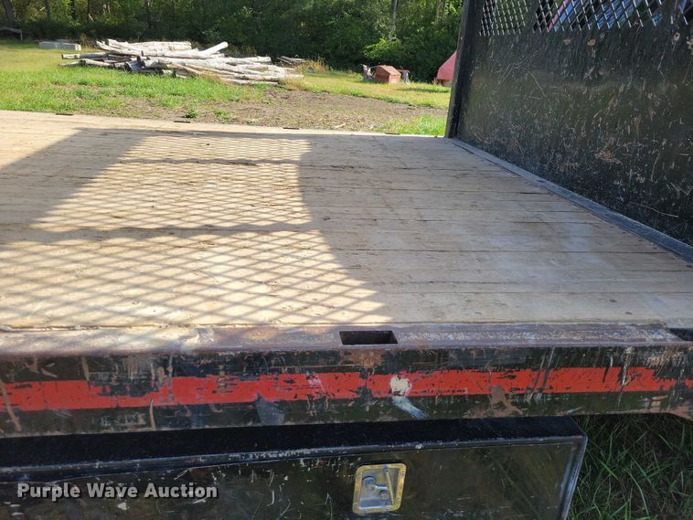 image for item EA2635 2015 RAM 5500 dump flatbed truck