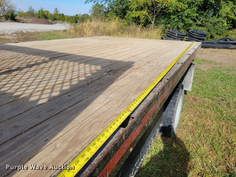 image for item EA2635 2015 RAM 5500 dump flatbed truck