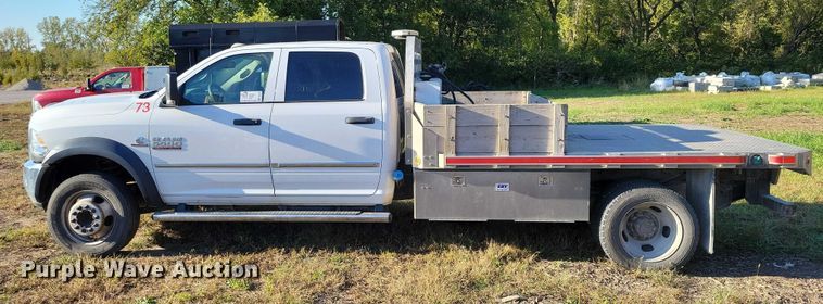 image for item EA2646 2017 RAM 5500 Crew Cab flatbed truck