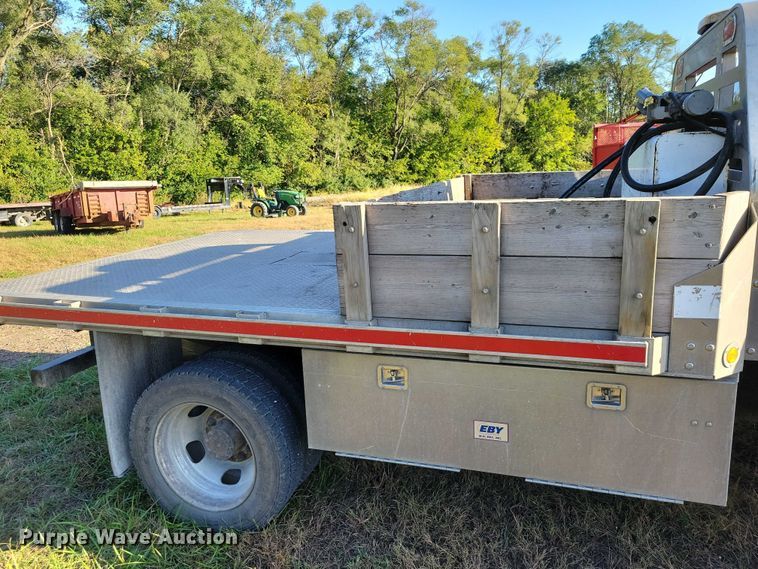 image for item EA2646 2017 RAM 5500 Crew Cab flatbed truck