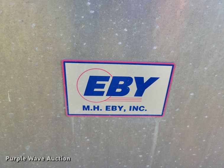 image for item EA2646 2017 RAM 5500 Crew Cab flatbed truck