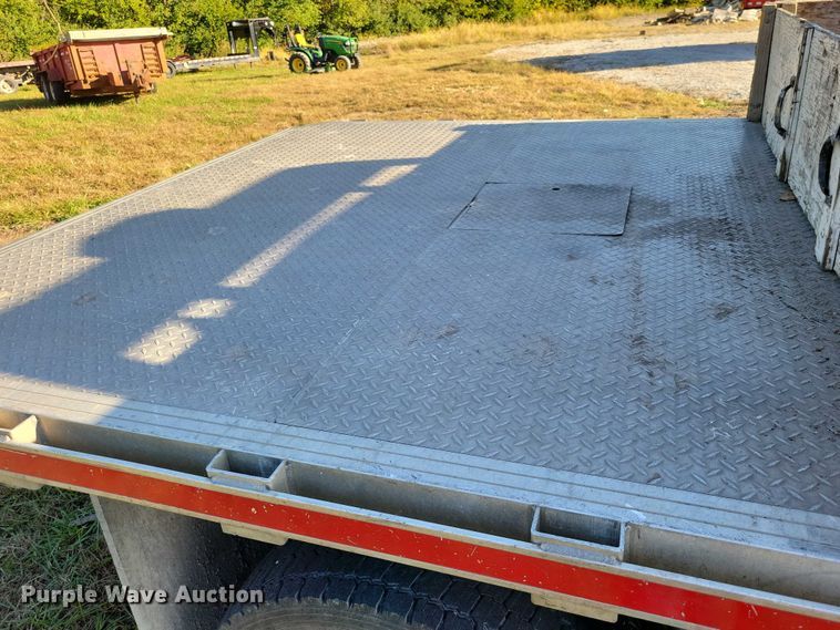 image for item EA2646 2017 RAM 5500 Crew Cab flatbed truck