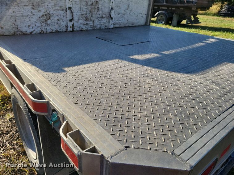 image for item EA2646 2017 RAM 5500 Crew Cab flatbed truck