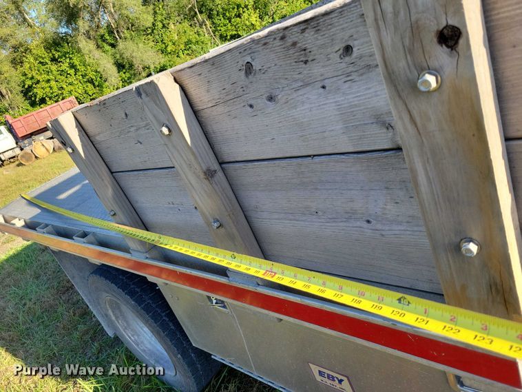 image for item EA2646 2017 RAM 5500 Crew Cab flatbed truck