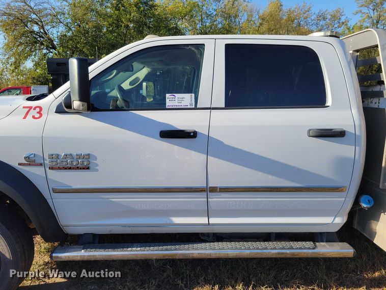 image for item EA2646 2017 RAM 5500 Crew Cab flatbed truck